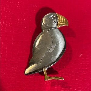 Vintage shields pewter parrot brooch